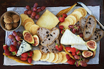 Selection of cheese, nuts dried & fresh fruit.