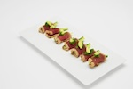 Seared yellowfin tuna with pickled cucumber wakame & wasabi mayo.